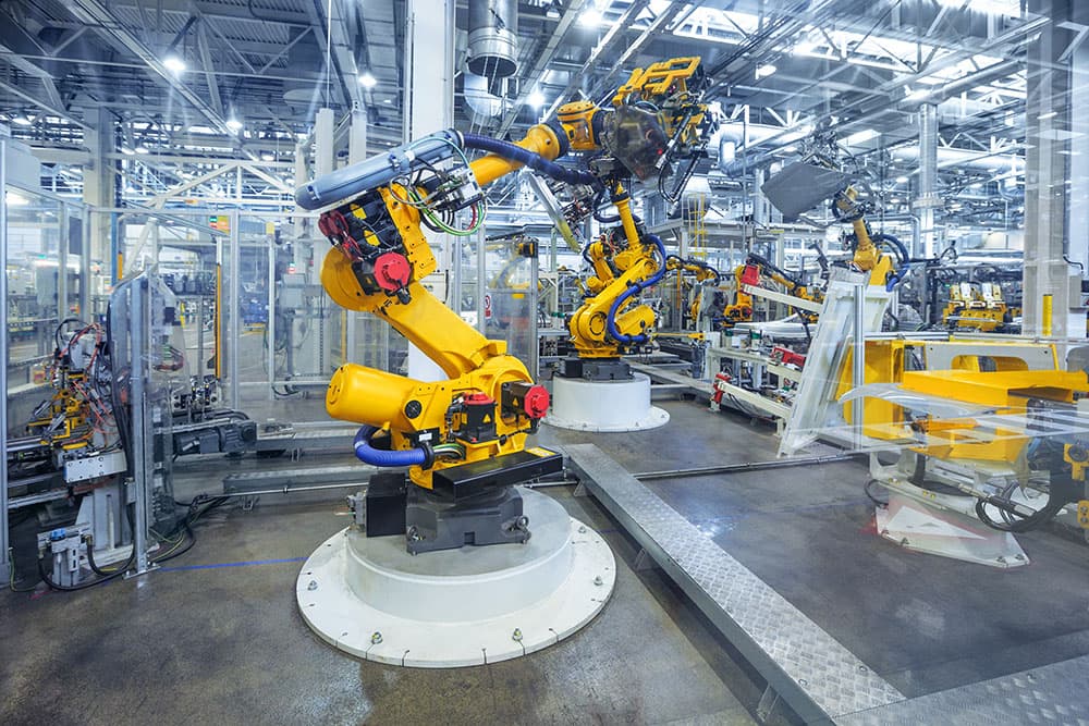 Modern manufacturing facility protected by cybersecurity services.